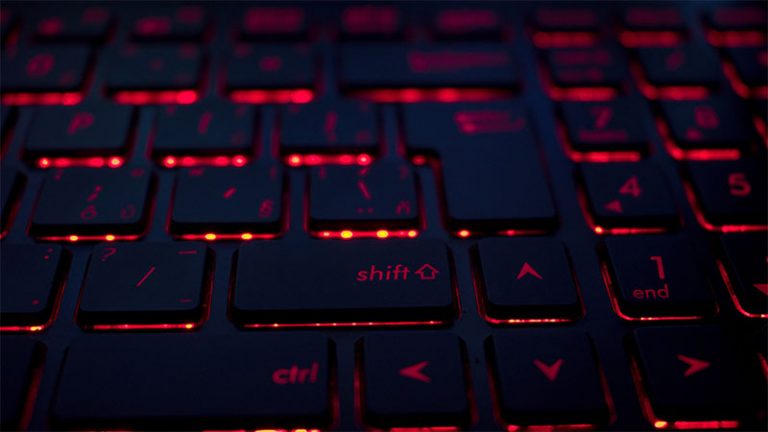 A keyboard with red lights designed for cybersecurity.